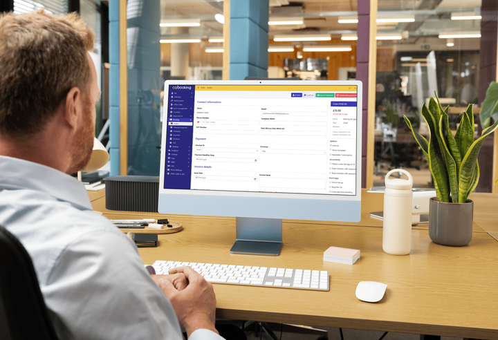 An operator reviewing a booking order on the cqbooking admin screen at a desktop